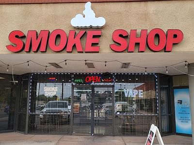 A Puff Above Smoke Shop Glass and Vape