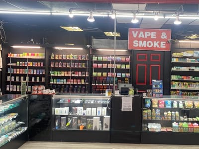 A Puff Above Smoke Shop Glass and Vape