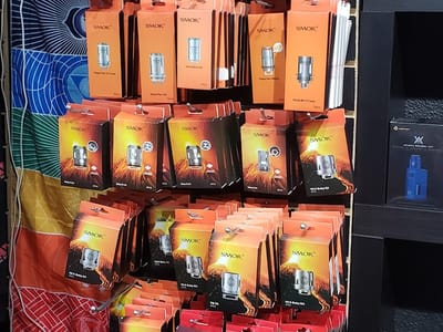 Metric Glass & Smoke Shop and Vape Certified, Shaved Ice Sno Cones and 100% Authentic Sneakers