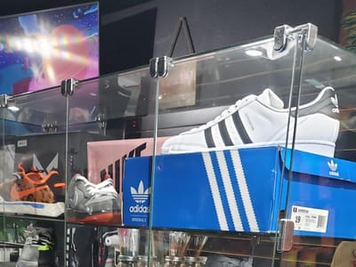 Metric Glass & Smoke Shop and Vape Certified, Shaved Ice Sno Cones and 100% Authentic Sneakers