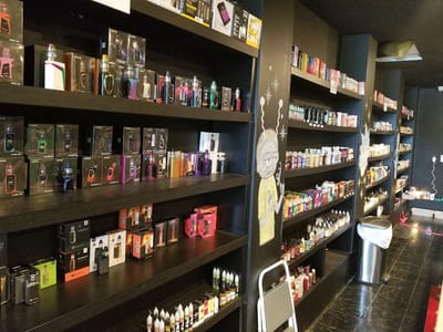 Metric Glass & Smoke Shop and Vape Certified, Shaved Ice Sno Cones and 100% Authentic Sneakers